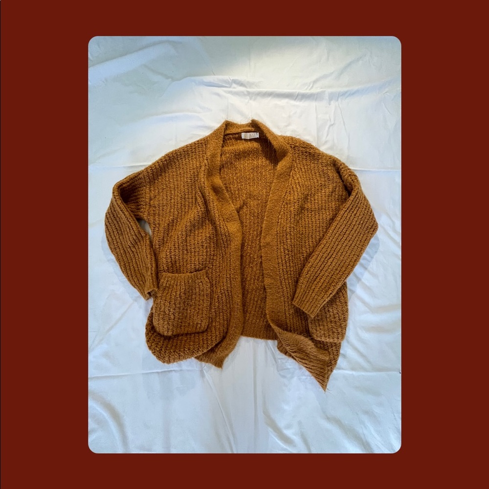 Thrifted orange cardigan